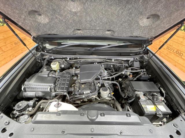 ランドクルーザープラド ＴＸ　禁煙車　サンルーフ　ルーフレール　ＳＤナビ　トヨタセーフティセンス　レーダークルーズ　ＬＥＤヘッドライト　クリアランスソナー　ウッドコンビステアリング　ＥＴＣ　オートエアコン　Ｂｌｕｅｔｏｏｔｈ再生（19枚目）