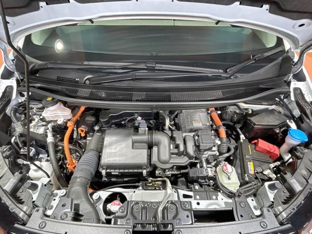 フリード ｅ：ＨＥＶエアー　ＥＸ　禁煙車　両側電動ドア　ディスプレイオーディオ　ブラインドスポットモニター　ホンダセンシング　レーダークルーズ　シートヒーター　純正１５インチＡＷ　ツートンカラーシート　オートエアコン　ＥＴＣ（19枚目）