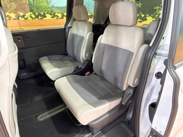 フリード ｅ：ＨＥＶエアー　ＥＸ　禁煙車　両側電動ドア　ディスプレイオーディオ　ブラインドスポットモニター　ホンダセンシング　レーダークルーズ　シートヒーター　純正１５インチＡＷ　ツートンカラーシート　オートエアコン　ＥＴＣ（26枚目）