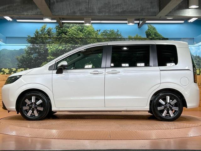 フリード ｅ：ＨＥＶエアー　ＥＸ　禁煙車　両側電動ドア　ディスプレイオーディオ　ブラインドスポットモニター　ホンダセンシング　レーダークルーズ　シートヒーター　純正１５インチＡＷ　ツートンカラーシート　オートエアコン　ＥＴＣ（49枚目）