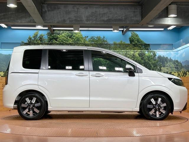 フリード ｅ：ＨＥＶエアー　ＥＸ　禁煙車　両側電動ドア　ディスプレイオーディオ　ブラインドスポットモニター　ホンダセンシング　レーダークルーズ　シートヒーター　純正１５インチＡＷ　ツートンカラーシート　オートエアコン　ＥＴＣ（51枚目）
