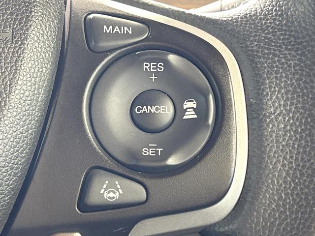 フリード クロスター・ホンダセンシング　禁煙車　両側電動ドア　純正ＳＤナビ　ホンダセンシング　クリアランスソナー　レーダークルーズ　ＬＥＤヘッドライト　バックカメラ　純正１５インチＡＷ　ウォークスルー　ＥＴＣ　オートエアコン　オートライト（7枚目）