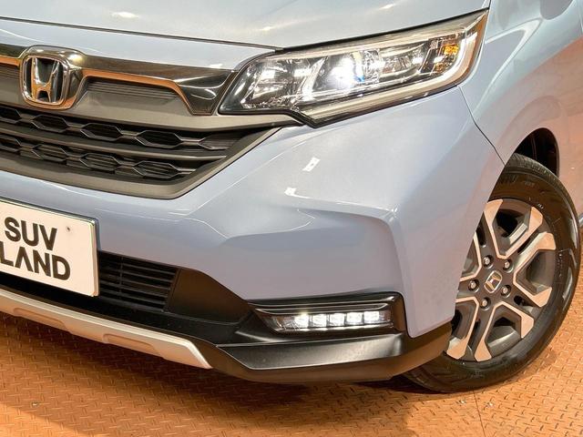 フリード クロスター・ホンダセンシング　禁煙車　両側電動ドア　純正ＳＤナビ　ホンダセンシング　クリアランスソナー　レーダークルーズ　ＬＥＤヘッドライト　バックカメラ　純正１５インチＡＷ　ウォークスルー　ＥＴＣ　オートエアコン　オートライト（13枚目）