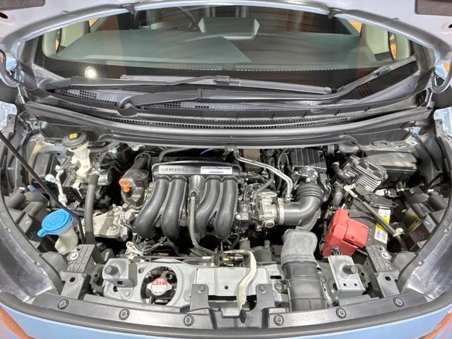 フリード クロスター・ホンダセンシング　禁煙車　両側電動ドア　純正ＳＤナビ　ホンダセンシング　クリアランスソナー　レーダークルーズ　ＬＥＤヘッドライト　バックカメラ　純正１５インチＡＷ　ウォークスルー　ＥＴＣ　オートエアコン　オートライト（19枚目）