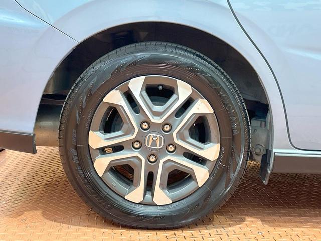 フリード クロスター・ホンダセンシング　禁煙車　両側電動ドア　純正ＳＤナビ　ホンダセンシング　クリアランスソナー　レーダークルーズ　ＬＥＤヘッドライト　バックカメラ　純正１５インチＡＷ　ウォークスルー　ＥＴＣ　オートエアコン　オートライト（31枚目）