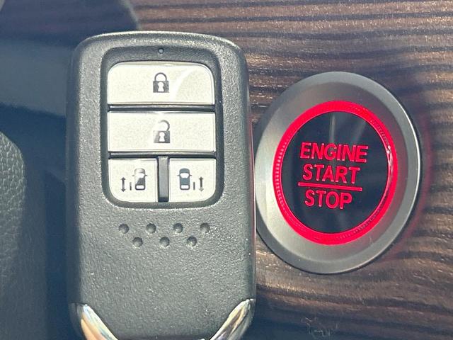 フリード クロスター・ホンダセンシング　禁煙車　両側電動ドア　純正ＳＤナビ　ホンダセンシング　クリアランスソナー　レーダークルーズ　ＬＥＤヘッドライト　バックカメラ　純正１５インチＡＷ　ウォークスルー　ＥＴＣ　オートエアコン　オートライト（34枚目）