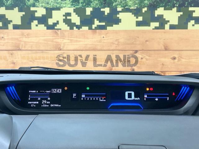 フリード クロスター・ホンダセンシング　禁煙車　両側電動ドア　純正ＳＤナビ　ホンダセンシング　クリアランスソナー　レーダークルーズ　ＬＥＤヘッドライト　バックカメラ　純正１５インチＡＷ　ウォークスルー　ＥＴＣ　オートエアコン　オートライト（51枚目）