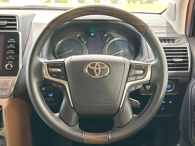 ランドクルーザープラド TX Lパッケージ 70thアニバーサリーリミテッド 禁煙 サンルーフ メーカーナビ 全周囲カメラ ブラインドスポットモニター レーダークルーズ シートベンチレーション ルーフレール パワーシート ETC スーパーライブサウンド オートハイビーム(11枚目)