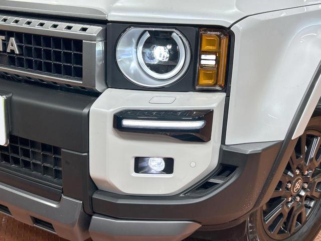 ランドクルーザー２５０ ＶＸ　禁煙　ＪＢＬ付１２型ディスプレイオーディオ　トヨタチームメイト　モデリスタパッケージ　シグネチャーイルミ　オーバーフェンダー　丸目ヘッドライト　デジタルインナーミラー　ブラインドスポットモニター（13枚目）