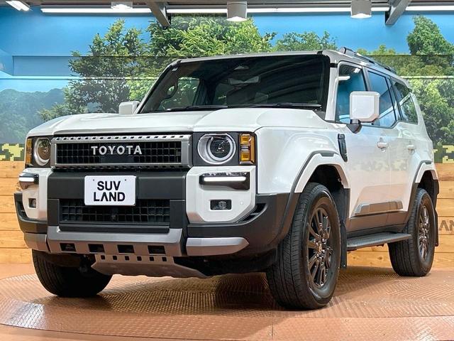 ランドクルーザー２５０ ＶＸ　禁煙　ＪＢＬ付１２型ディスプレイオーディオ　トヨタチームメイト　モデリスタパッケージ　シグネチャーイルミ　オーバーフェンダー　丸目ヘッドライト　デジタルインナーミラー　ブラインドスポットモニター（25枚目）