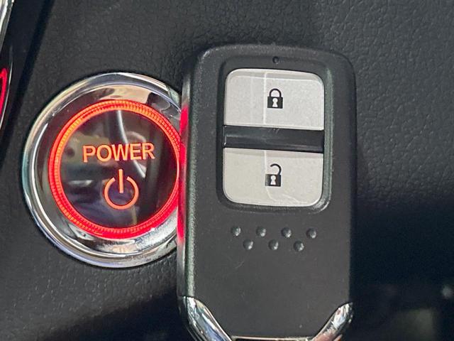 ヴェゼル ハイブリッドＸ・ホンダセンシング　禁煙車　純正ナビ　バックカメラ　レーダークルーズ　ＬＥＤヘッド　オートハイビーム　純正１６インチアルミ　スマートキー　ＥＴＣ　オートエアコン　パドルシフト　フルセグ　Ｂｌｕｅｔｏｏｔｈ再生（8枚目）