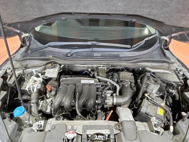 ヴェゼル ハイブリッドＸ・ホンダセンシング　禁煙車　純正ナビ　バックカメラ　レーダークルーズ　ＬＥＤヘッド　オートハイビーム　純正１６インチアルミ　スマートキー　ＥＴＣ　オートエアコン　パドルシフト　フルセグ　Ｂｌｕｅｔｏｏｔｈ再生（19枚目）