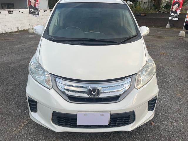 フリードハイブリッド ジャストセレクション 純正ナビ・TV・バックカメラ・ETC・ハーフレザーシート・クルーズコントロール・両側パワースライドドア・スマートキー・車検8年11月(2枚目)