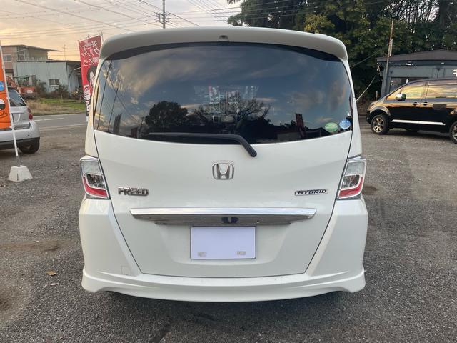 フリードハイブリッド ジャストセレクション 純正ナビ・TV・バックカメラ・ETC・ハーフレザーシート・クルーズコントロール・両側パワースライドドア・スマートキー・車検8年11月(7枚目)