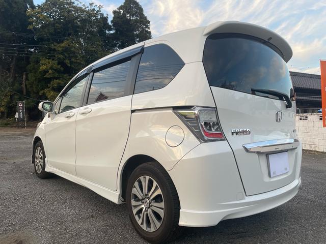 フリードハイブリッド ジャストセレクション 純正ナビ・TV・バックカメラ・ETC・ハーフレザーシート・クルーズコントロール・両側パワースライドドア・スマートキー・車検8年11月(8枚目)