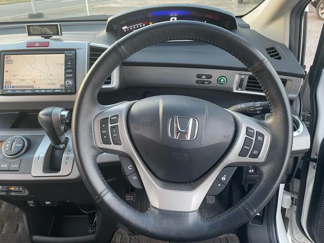 フリードハイブリッド ジャストセレクション 純正ナビ・TV・バックカメラ・ETC・ハーフレザーシート・クルーズコントロール・両側パワースライドドア・スマートキー・車検8年11月(17枚目)