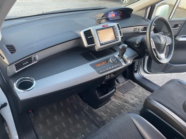 フリードハイブリッド ジャストセレクション 純正ナビ・TV・バックカメラ・ETC・ハーフレザーシート・クルーズコントロール・両側パワースライドドア・スマートキー・車検8年11月(24枚目)