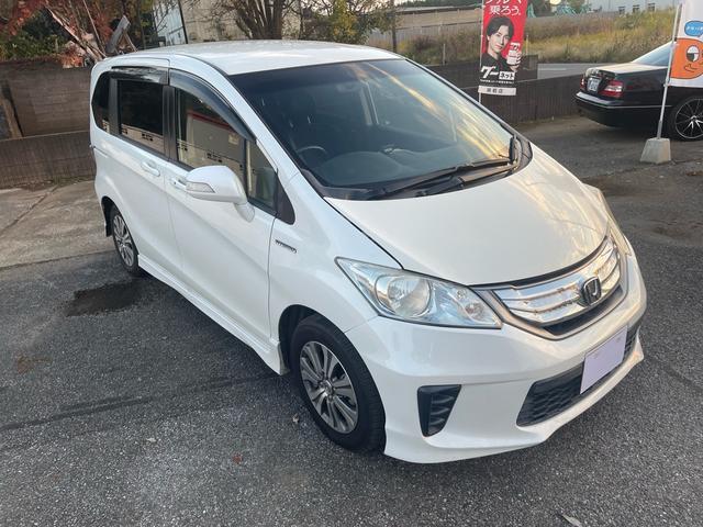 フリードハイブリッド ジャストセレクション 純正ナビ・TV・バックカメラ・ETC・ハーフレザーシート・クルーズコントロール・両側パワースライドドア・スマートキー・車検8年11月(26枚目)