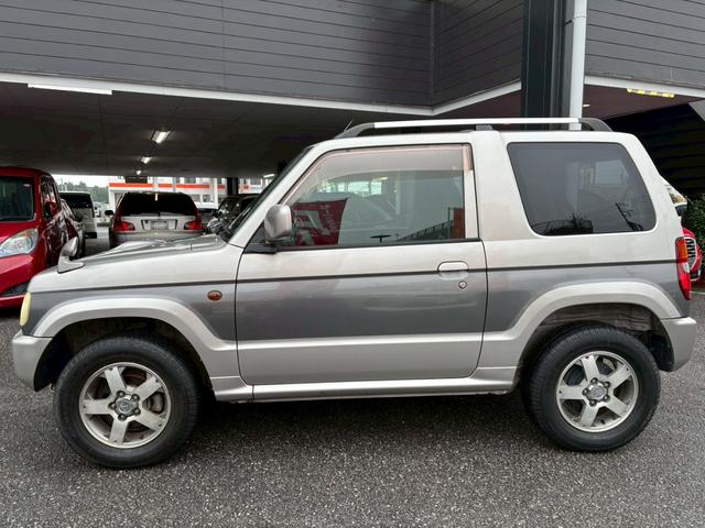 パジェロミニ アニバーサリーリミテッド ユーザー買取車/カロッツェリア製HDDナビ/キーレスエントリー/電動格納ミラー/CD/DVD/フロントフォグランプ/純正15インチAW/ドアバイザー(30枚目)