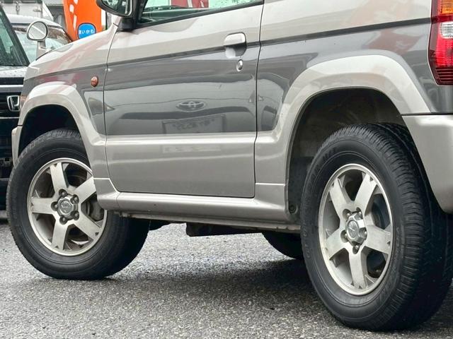 パジェロミニ アニバーサリーリミテッド ユーザー買取車/カロッツェリア製HDDナビ/キーレスエントリー/電動格納ミラー/CD/DVD/フロントフォグランプ/純正15インチAW/ドアバイザー(36枚目)