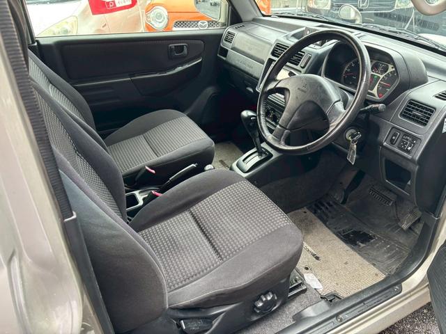 パジェロミニ アニバーサリーリミテッド ユーザー買取車/カロッツェリア製HDDナビ/キーレスエントリー/電動格納ミラー/CD/DVD/フロントフォグランプ/純正15インチAW/ドアバイザー(43枚目)