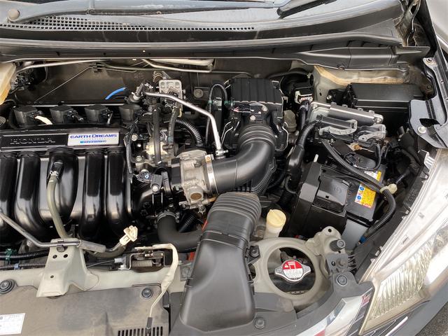 フィットハイブリッド Lパッケージ 距離無制限12ケ月保証付 ETC バックカメラ ナビ TV オートクルーズコントロール オートライト LEDヘッドランプ スマートキー アイドリングストップ 電動格納ミラー 盗難防止システム(25枚目)