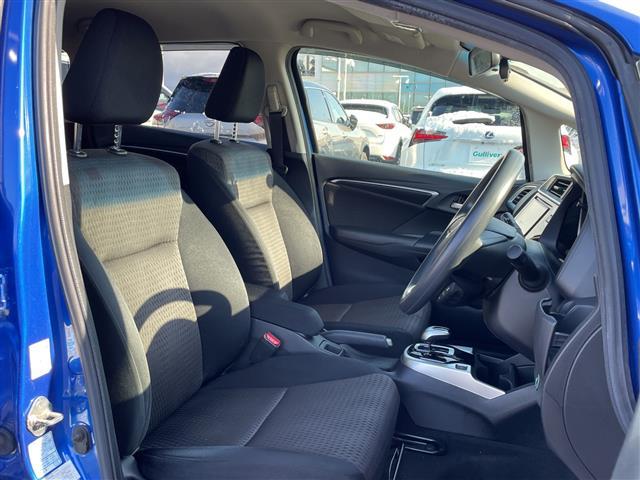 フィットハイブリッド Ｆ　４ＷＤ／衝突軽減ブレーキ／レーンキープアシスト／レーダークルーズコントロール／社外ナビ／Ｂｌｕｅｔｏｏｔｈ／バックカメラ／ドライブレコーダー／エンジンスターター／ワイパーデアイサー（22枚目）