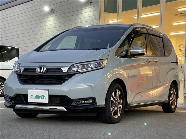 フリードハイブリッド ハイブリッド・クロスター 純正9インチプレミアムインターナビ Bluetooth フルセグ HDMI アップルカープレイ CD/DVD 純正15.6インチフリップダウン ETC 両側パワースライド ハーフレザーシート(33枚目)