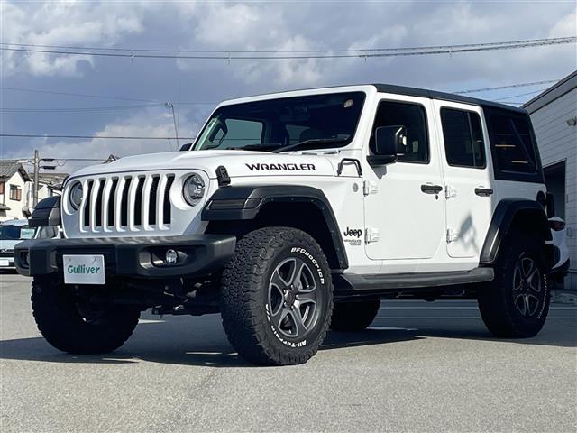 ジープ・ラングラーアンリミテッド スポーツ　純正ナビ　Ｂｌｕｅｔｏｏｔｈ接続　ＥＴＣ　バック・サイドカメラ　クルーズコントロール　オートライト　コーナーセンサー　オープン　ＡＵＸ　スマートキー　純正ゴムマット　フォグランプ　背面タイヤ（33枚目）