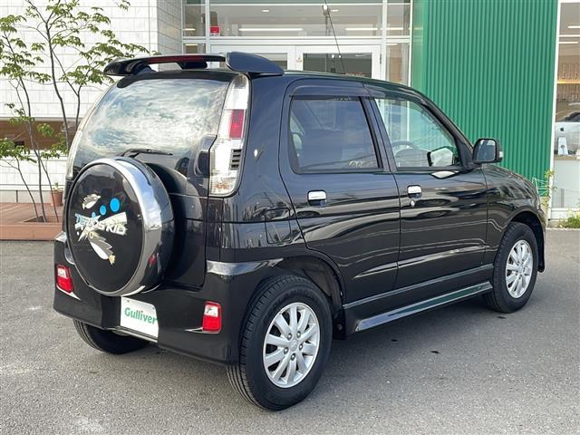 テリオスキッド カスタム　メモリアルエディション　４ＷＤ　純正ＣＤオーディオ　純正エアロパーツ　ハロゲンヘッドライト　フォグランプ　純正１５インチアルミホイール　ウインカーミラー　リモコンキー　スペアキー　ライトレベライザー　純正フロアマット（32枚目）