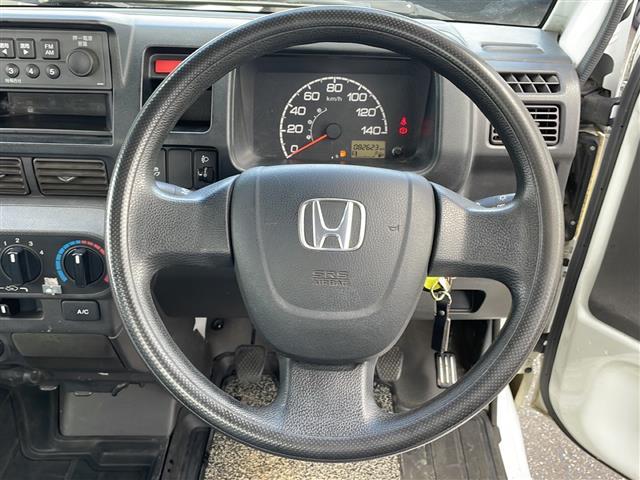 アクティトラック ＳＤＸ　４ＷＤ　５速マニュアル　ワンオーナー　エアコン　純正ラジオ　ガードパイプ付鳥居　荷台ランプ　荷台純正保護カバー　社外１２インチアルミ　パワーステアリング　運転席エアバッグ（14枚目）