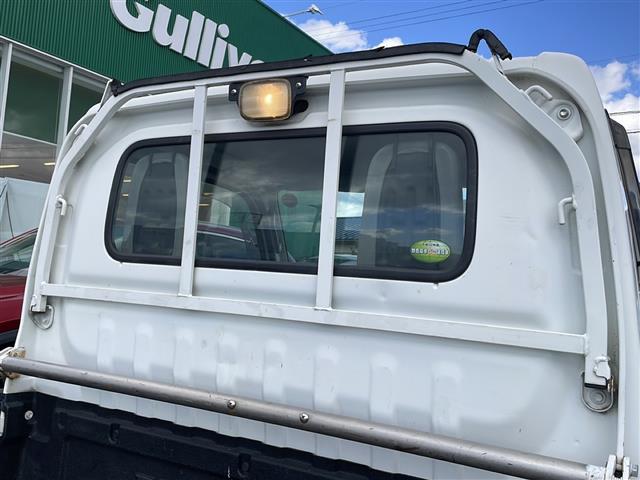 アクティトラック ＳＤＸ　４ＷＤ　５速マニュアル　ワンオーナー　エアコン　純正ラジオ　ガードパイプ付鳥居　荷台ランプ　荷台純正保護カバー　社外１２インチアルミ　パワーステアリング　運転席エアバッグ（34枚目）