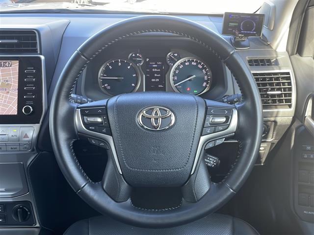 ランドクルーザープラド TX Lパッケージ 4WD 寒冷地仕様 メーカーナビ フルセグ パノラミックビューモニター 黒レザーシート 前席エアシート・ヒーター 3列目電動格納 セーフティセンス クリアランスソナー デアイサー バッテリー2個(16枚目)