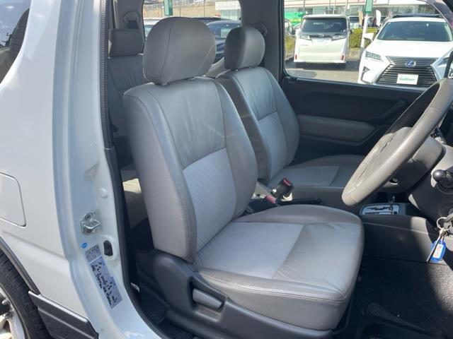 ジムニー ランドベンチャー ナビ ルーフレール ETC シートヒーター ドライブレコーダー 純正アルミホイール スペアキー スペアタイヤ リモコンキー ASSURAレーダー探知機 ハーフレザーシート 4WD パワーウィンドウ(18枚目)