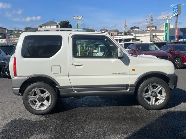 ジムニー ランドベンチャー ナビ ルーフレール ETC シートヒーター ドライブレコーダー 純正アルミホイール スペアキー スペアタイヤ リモコンキー ASSURAレーダー探知機 ハーフレザーシート 4WD パワーウィンドウ(26枚目)