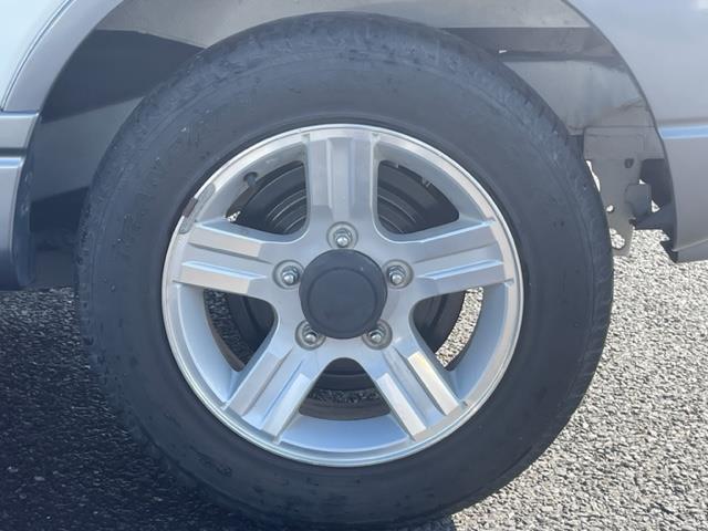 ジムニー ランドベンチャー ナビ ルーフレール ETC シートヒーター ドライブレコーダー 純正アルミホイール スペアキー スペアタイヤ リモコンキー ASSURAレーダー探知機 ハーフレザーシート 4WD パワーウィンドウ(36枚目)