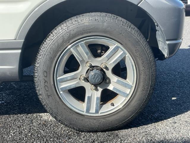 ジムニー ランドベンチャー ナビ ルーフレール ETC シートヒーター ドライブレコーダー 純正アルミホイール スペアキー スペアタイヤ リモコンキー ASSURAレーダー探知機 ハーフレザーシート 4WD パワーウィンドウ(38枚目)