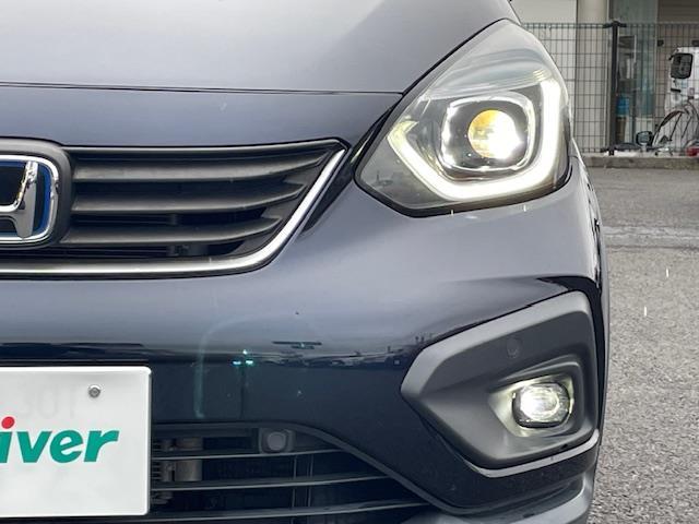 フィット ｅ：ＨＥＶクロスター　純正ナビ　衝突軽減システム　バックカメラ　コーナーセンサー前後　レーダークルーズコントロール　ドライブレコーダー前後　電動格納ミラー　アイドリングストップ　置くだけ充電器　オートライト　ＥＴＣ（34枚目）