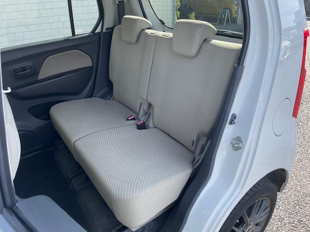 ワゴンＲ ＦＸ　１４インチｗａｒｅｎアルミホイール　純正アルミホイール付サマータイヤ４本　オーディオ　ＣＤチェンジャー　ＥＴＣ　アイドリングストップ　オートエアコン　パワーウィンドウ　純正フロアマット（24枚目）