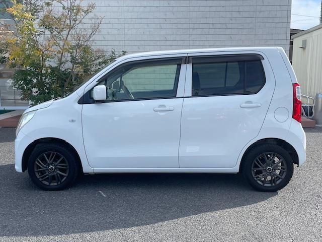 ワゴンＲ ＦＸ　１４インチｗａｒｅｎアルミホイール　純正アルミホイール付サマータイヤ４本　オーディオ　ＣＤチェンジャー　ＥＴＣ　アイドリングストップ　オートエアコン　パワーウィンドウ　純正フロアマット（30枚目）