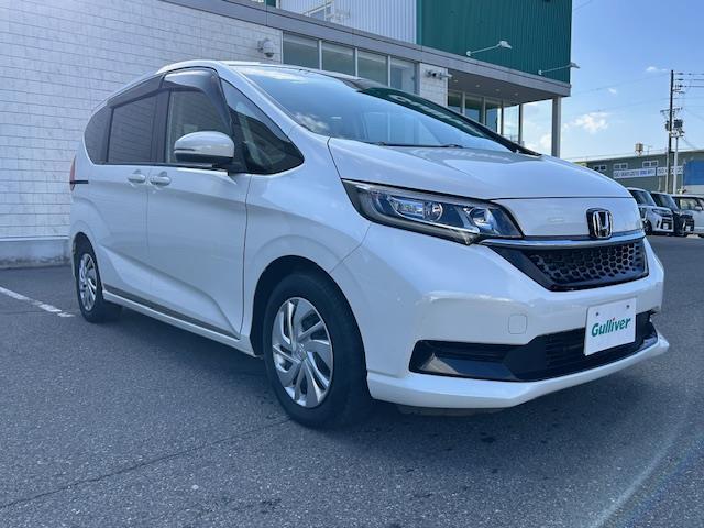 フリード G・ホンダセンシング 純正9インチナビ フルセグ Bluetooth バックカメラ フリップダウンモニター 両側パワースライドドア シートヒーター レーダークルーズコントロール LEDヘッドライト ETC ドラレコ(16枚目)