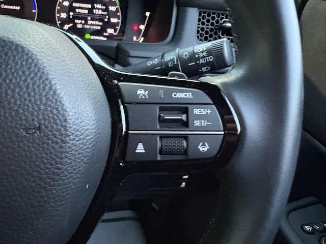 ステップワゴン e:HEVスパーダ プレミアムライン 純正15.6型フリップダウンモニター 純正11.4型ナビ 全方位カメラ BSM ホンダセンシング 電動リアゲート 両側パワースライドドア ドラレコ 前/後席シートヒーター ETC オットマンチェア(12枚目)