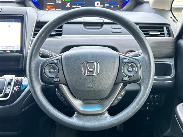 フリードハイブリッド ハイブリッド・Gブラックスタイル 9インチナビ フルセグ Bluetooth バックカメラ 両側パワースライドドア シートヒーター レーダークルーズコントロール 前後ドライブレコーダー ETC フロアーマット サイドバイザー(9枚目)