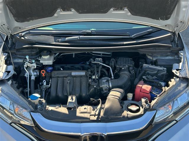 フィットハイブリッド Ｓ　ホンダセンシング　純正８インチナビ　バックカメラ　衝突被害軽減システム　レーダークルーズコントロール　レーンキープアシスト　ＥＴＣ　ＬＥＤヘッドライト　オートライト　純正フロアマット　純正アルミホイール　スペアキー（26枚目）