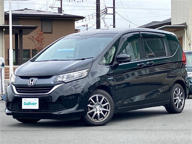 フリードハイブリッド ハイブリッド・EX 純正9インチナビ/バックカメラ/後席モニター/ドライブレコーダー/寒冷地仕様/レーダークルーズコントロール/ETC/D席N席シートヒーター/両側パワースライドドア/レーンキープアシスト/衝突軽減(3枚目)