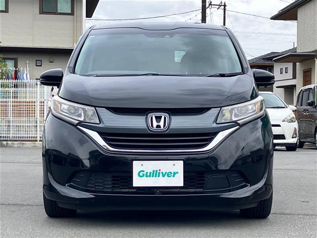 フリードハイブリッド ハイブリッド・EX 純正9インチナビ/バックカメラ/後席モニター/ドライブレコーダー/寒冷地仕様/レーダークルーズコントロール/ETC/D席N席シートヒーター/両側パワースライドドア/レーンキープアシスト/衝突軽減(6枚目)