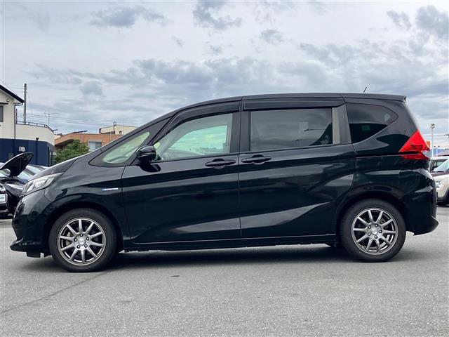 フリードハイブリッド ハイブリッド・EX 純正9インチナビ/バックカメラ/後席モニター/ドライブレコーダー/寒冷地仕様/レーダークルーズコントロール/ETC/D席N席シートヒーター/両側パワースライドドア/レーンキープアシスト/衝突軽減(9枚目)