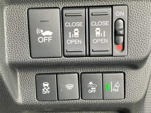 フリードハイブリッド ハイブリッド・EX 純正9インチナビ/バックカメラ/後席モニター/ドライブレコーダー/寒冷地仕様/レーダークルーズコントロール/ETC/D席N席シートヒーター/両側パワースライドドア/レーンキープアシスト/衝突軽減(18枚目)