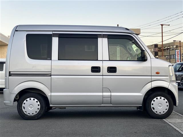 NV100クリッパーバン GX マニュアルエアコン/リモコンキー/パワーウィンドウ/パワーステアリング/CD.CDチェンジャー/純正フロアマット/布シート/両側スライドドア/盗難防止装置(7枚目)