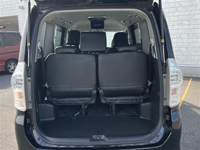 ヴォクシー ZS 煌 社外SDナビ BT CD ワンセグ バックカメラ 社外フリップダウンモニター パドルシフト 両側パワースライドドア 純正16インチアルミホイール 革巻きステアリング レザー調シートカバー HID(22枚目)